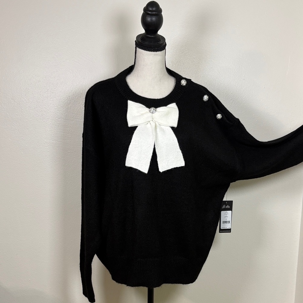 Authentic Karl Lagerfeld Black Knit Sweater with White Bow and jeweled buttons